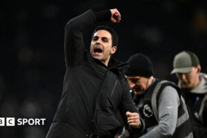 Arsenal pass derby test of nerve as league title race looks set to go to wire