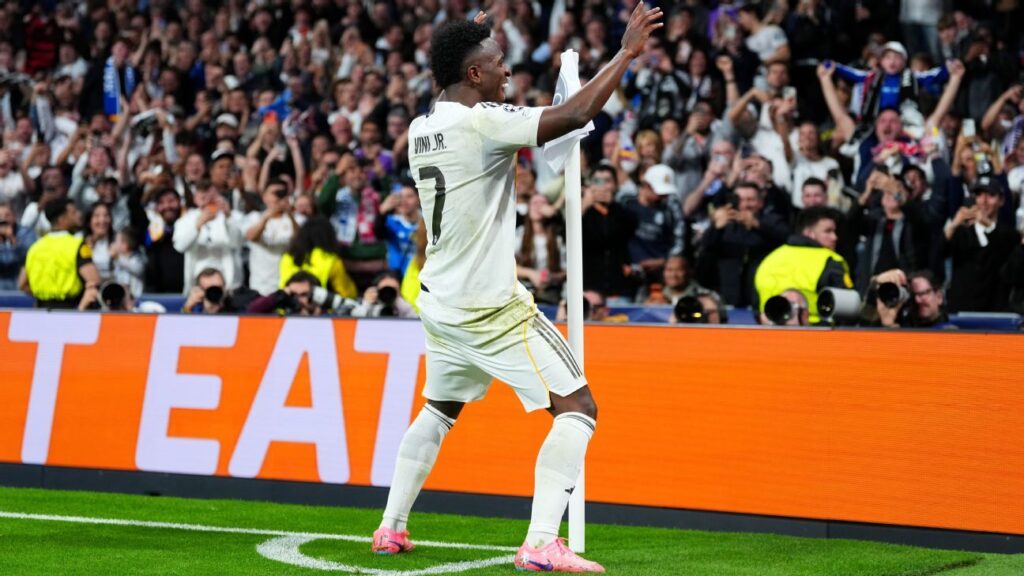 Vinícius seals Madrid progress amid Benfica boos