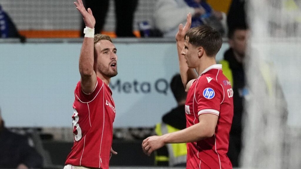 Wrexham overcome illness to cement playoff spot