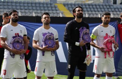 Iran football team stages protest over school girls killed by US Israeli strikes