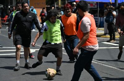 Mexican citizens kick about football bearing Trump face, protest against World Cup ‘dispossession’