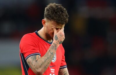 White booed after scoring and gives away penalty in draw with Uruguay