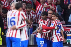 Atletico overcome Barcelona fightback to reach CL semis