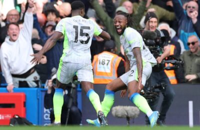 Man City closes in on Arsenal in Premier League title race with 3 0 win over Chelsea