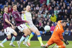 Man City struggle but go top of the Premier League and relegate Burnley